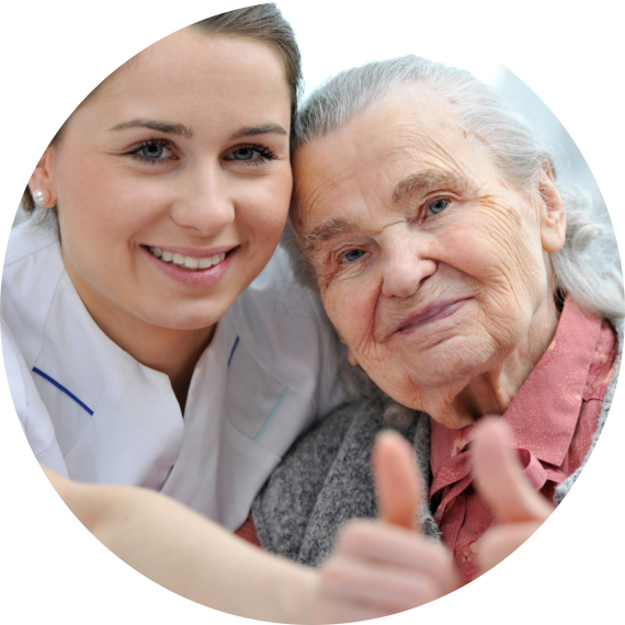 elderly woman and young woman thumbs up